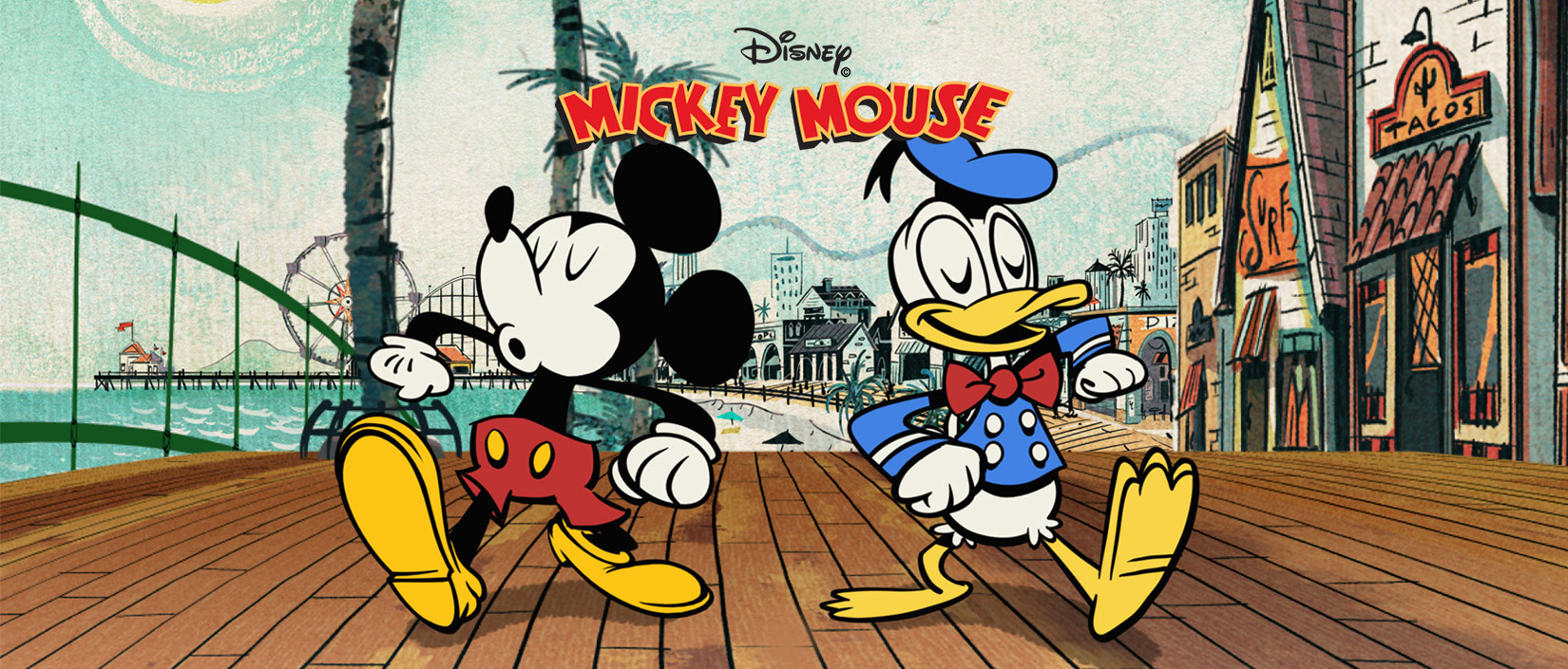 Mickey and Donald from Mickey Mouse Shorts walk down a boardwalk with an amusement park in the background. The words ‘Disney’ and ‘Mickey Mouse’ are overlayed.