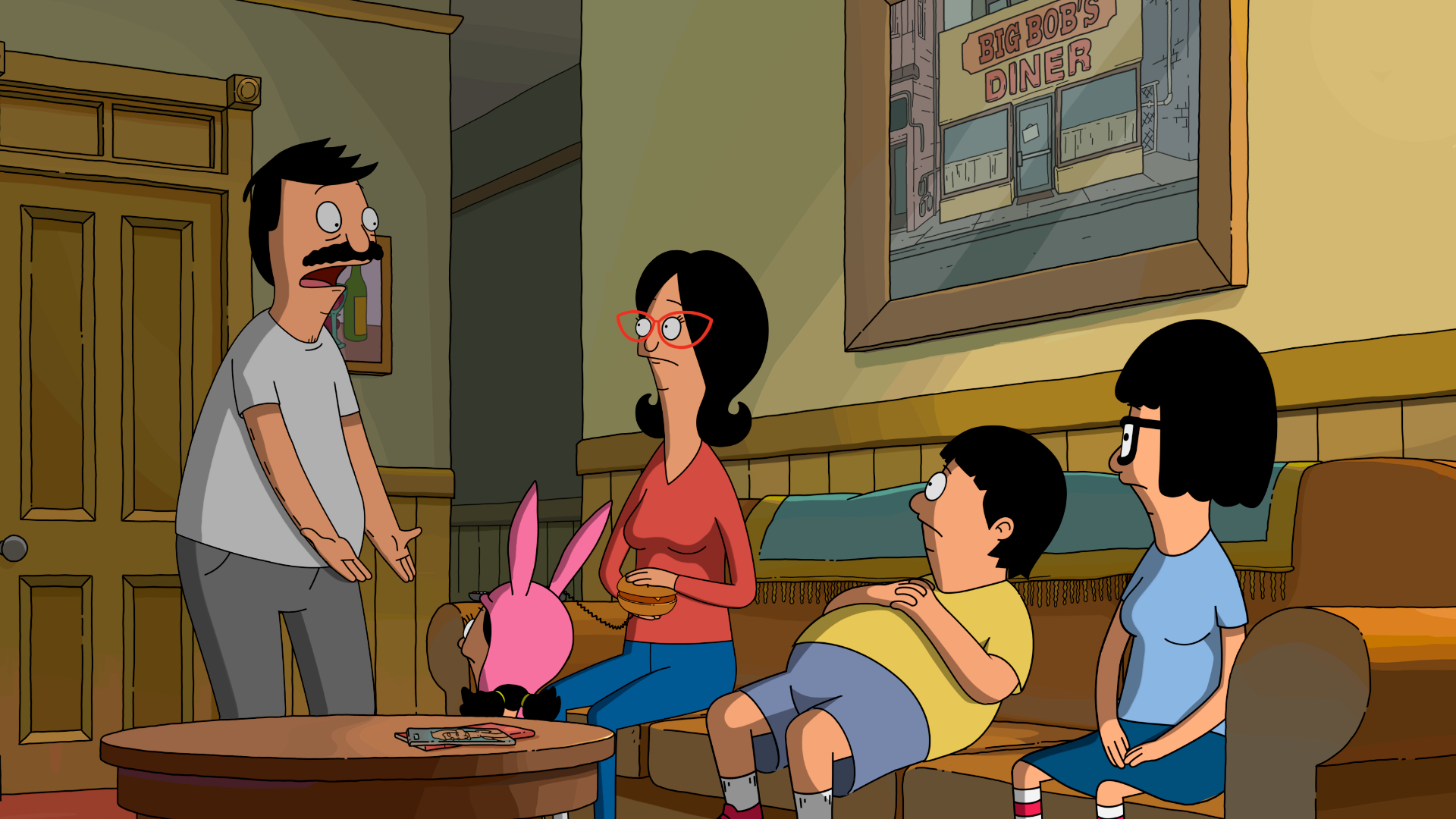 Linda, Gene, Tina, and Louise sit on the couch in their living room staring at Bob as Bob looks frustrated explaining something to them.
